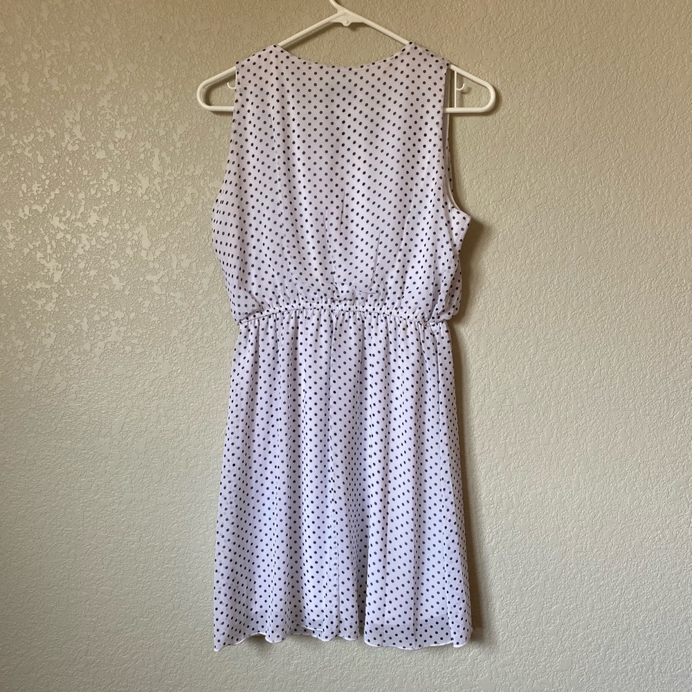 Black and white poka dot knee length dress